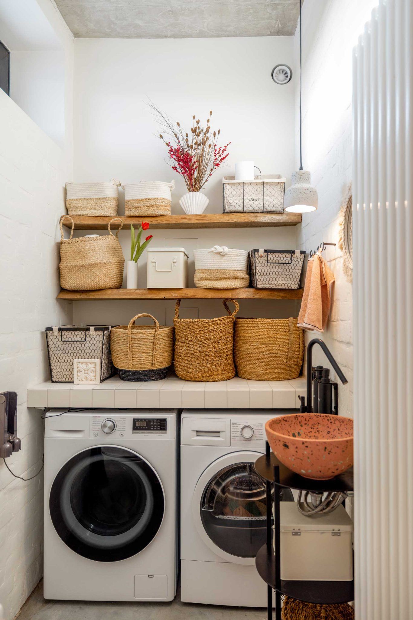 an image of laundry machines and space to keep cloths